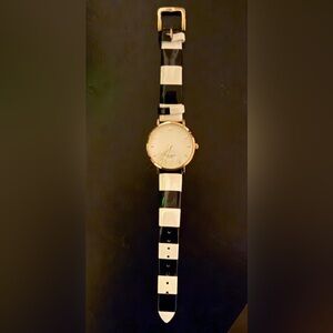 Kate Spade black and white “Live Colorfully” watch.